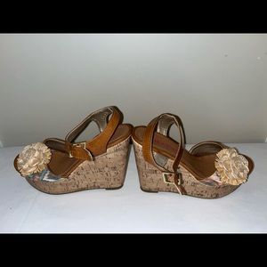 Cork wedge with ankle strap. 5 1/4” heel. Never been worn. So sexy!